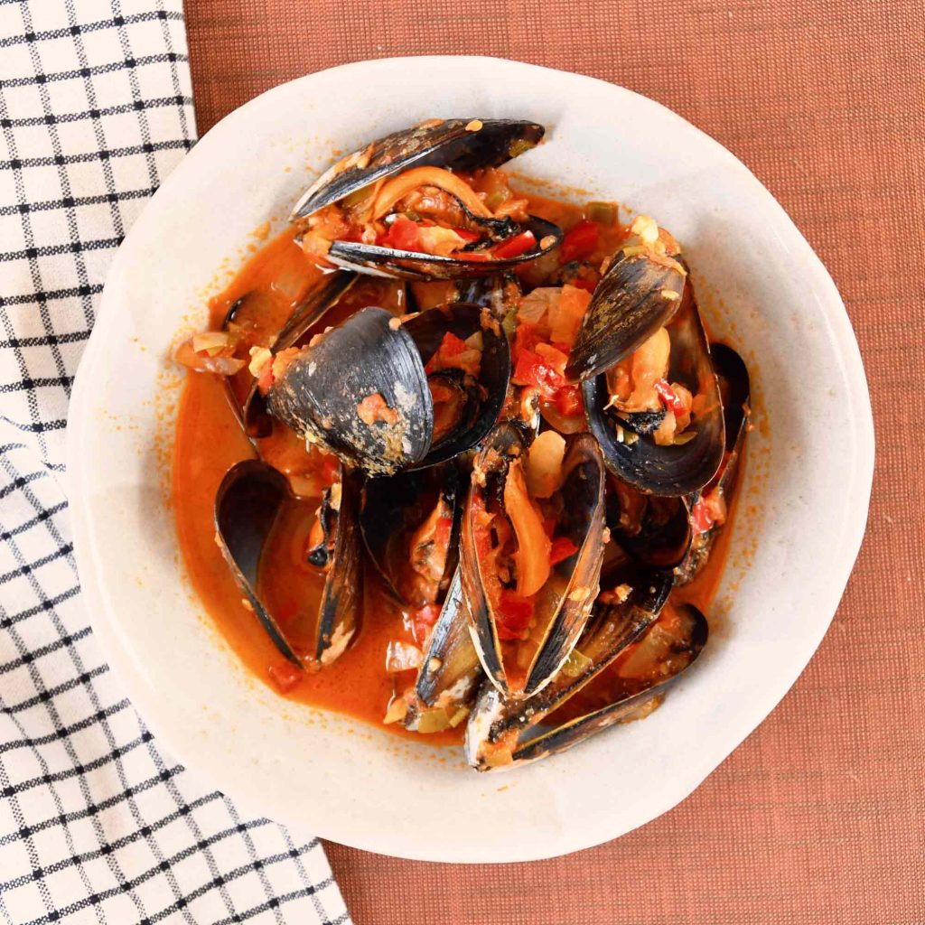 Mejillones en salsa de tomate picante para robot de cocina