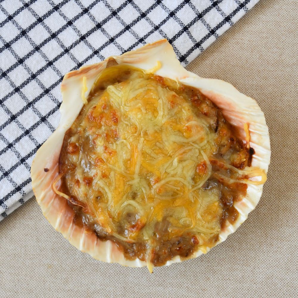 conchas rellenas de gambas y boletus